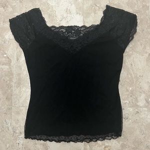 Ideology black off-the-shoulder top with lace sleeves.